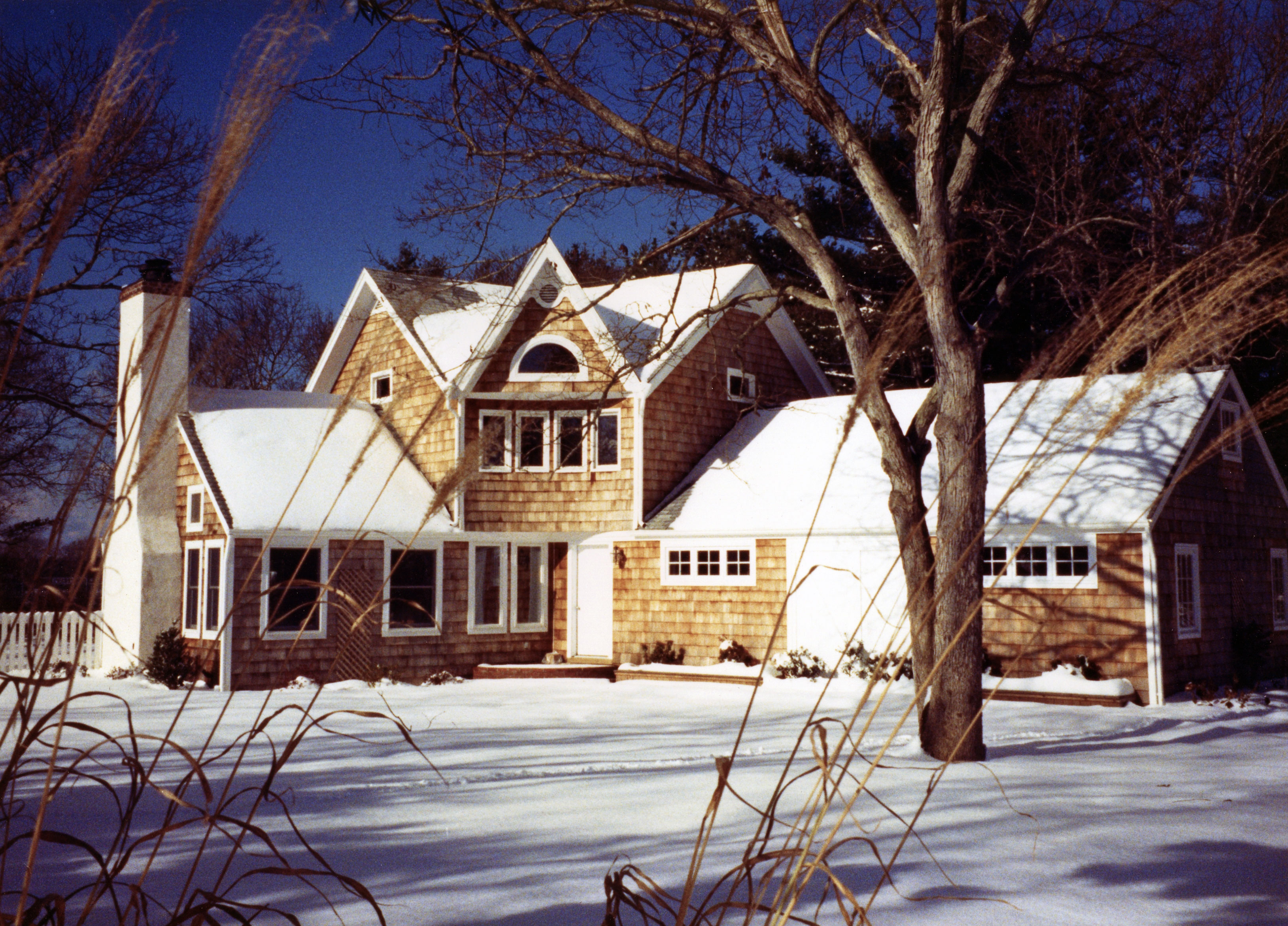 A snow covered house in East Hampton Long Island, New York